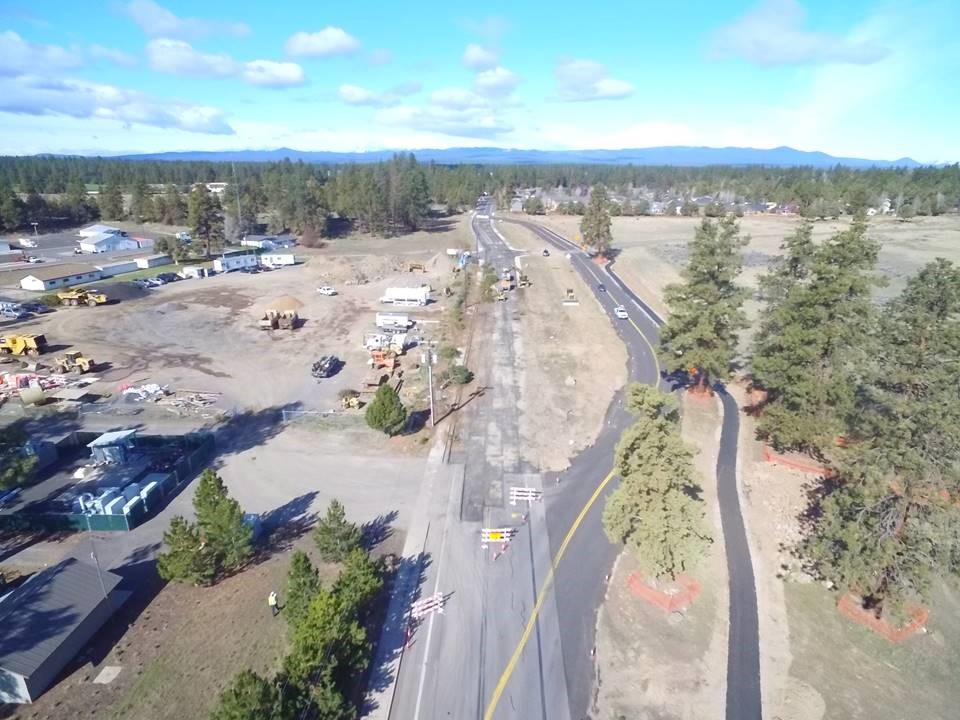 An aerial photo looking west over the active temporary bypass road and Murphy Rd construction work.