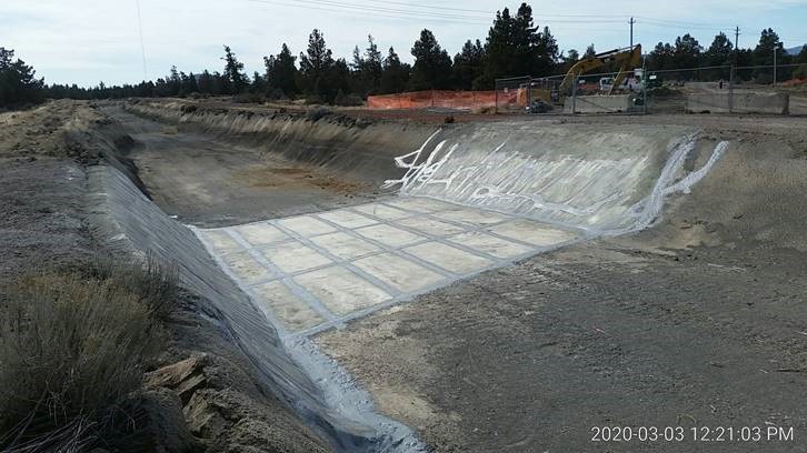A photo of the final sealing and restoration of the NUID Canal.