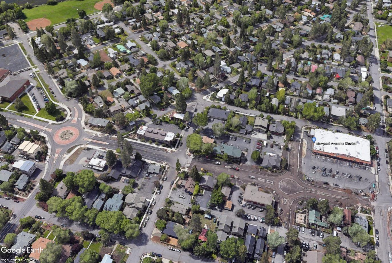 An aerial photo from Google Earth Terrain Imagery overlooking the progress of the Newport Avenue Corridor in June 2022.