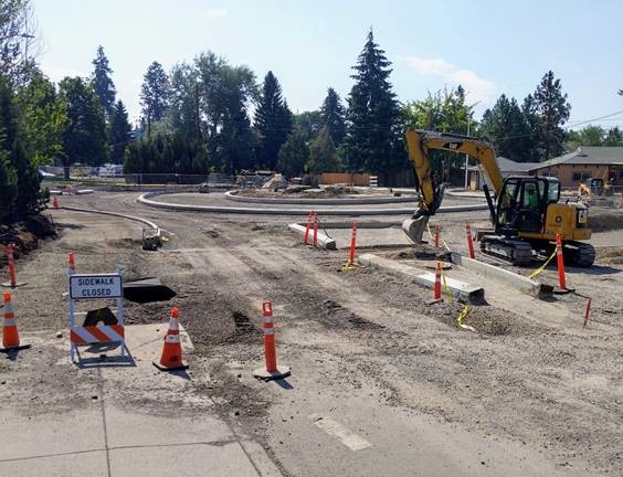 A photo of the progress on the 9th St. & Newport Ave. roundabout continues with curbs defining the shape of the roundabout.