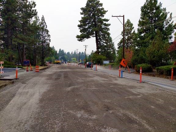 A photo of the blue cones used to designate business access along the Segment 5 Newport Ave closure.