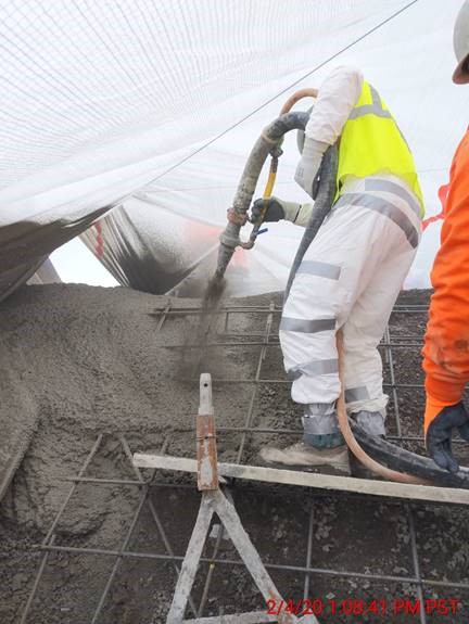 A photo of the North Interceptor Project's Work Crew spraying shotcrete for the North Unit canal restoration.