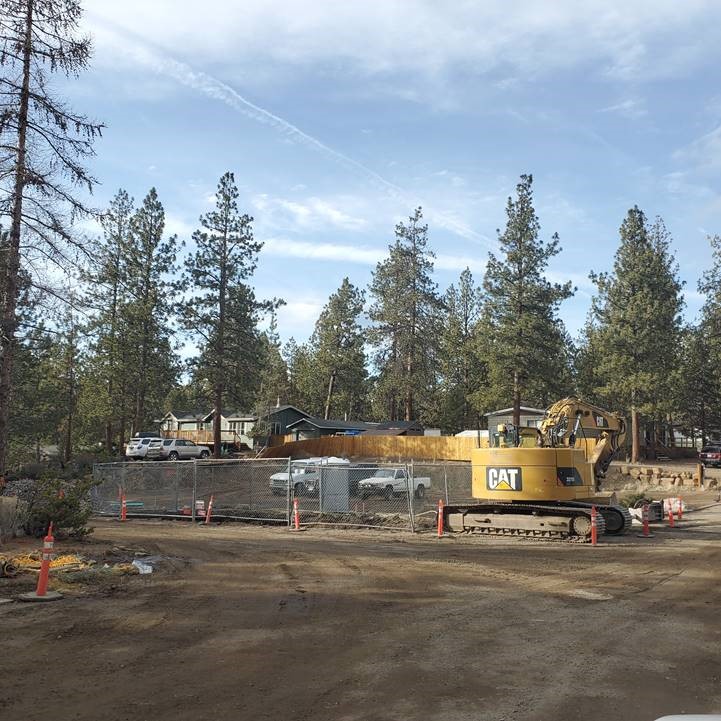 A photo of work crews and excavation equipment excavating for the new stormwater facility in Cinder Lane.