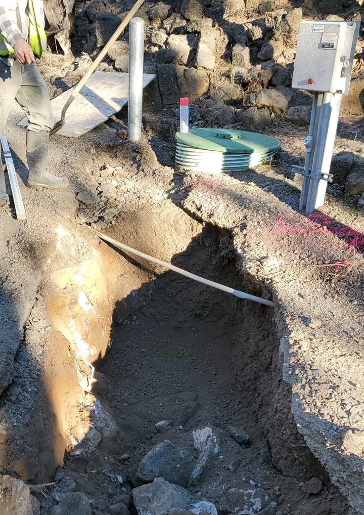 A photo of the new sewer service line from a new sewer main to the existing pump station on Cinder Lane.