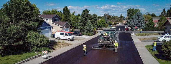 A residential street being paved