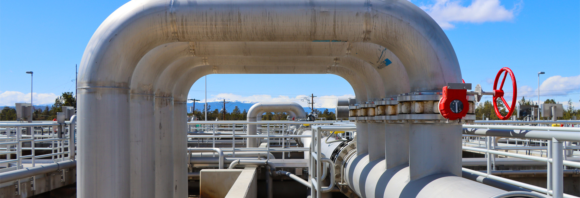 Water pipes gray in color going into the Water Reclamation Facility.