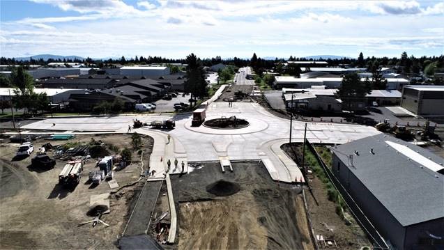 An aerial photo overlooking the 9th & Wilson Avenue roundabout facing east.