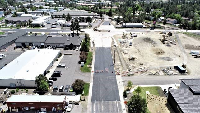 An aerial photo looking south over the 9th Street & Wilson Avenue roundabout.