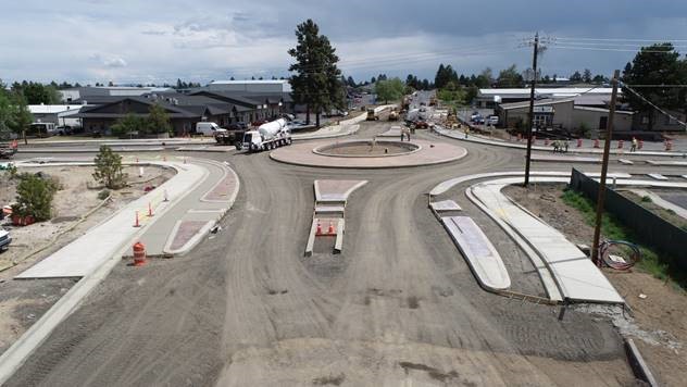 A image of the 9th Street & Wilson Avenue roundabout, looking east as of 6/2/2022