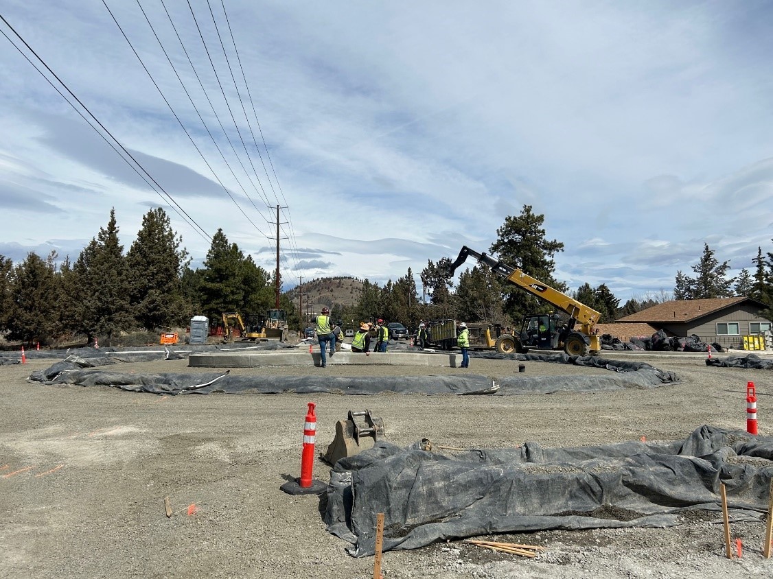 An image of work crews working on the future 15th Street roundabout.