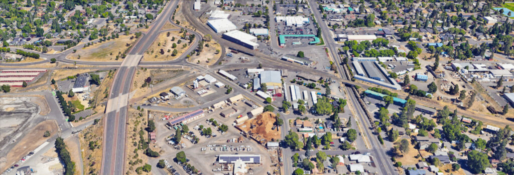 Overhead shot of project area, roads, highways, businesses, houses.
