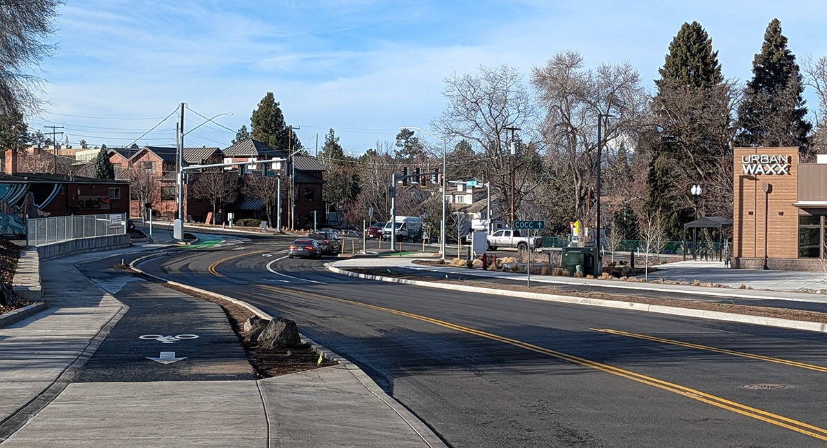 Intersection on a city street with a stoplight.