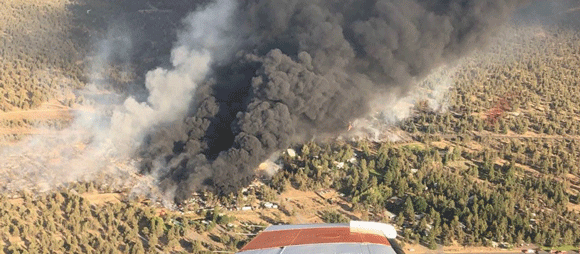 A view from a plane of a wildfire.