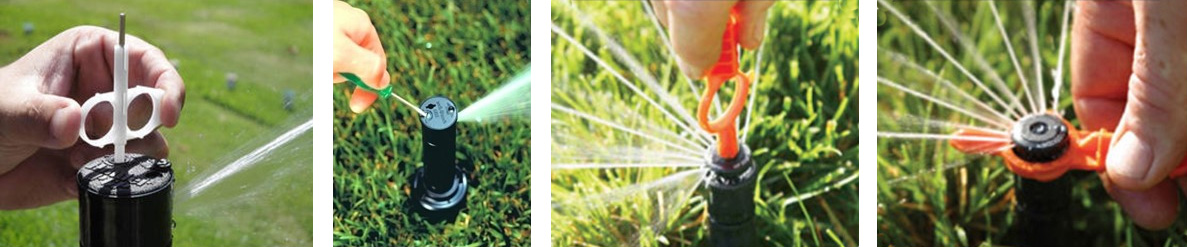 Tools being used to adjust sprinklers.