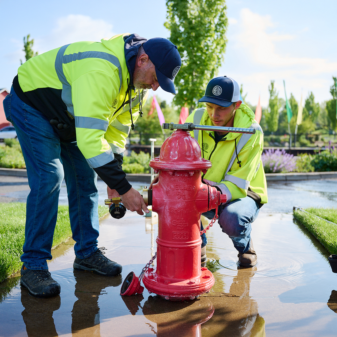 Utility crew working on fire hydrant.