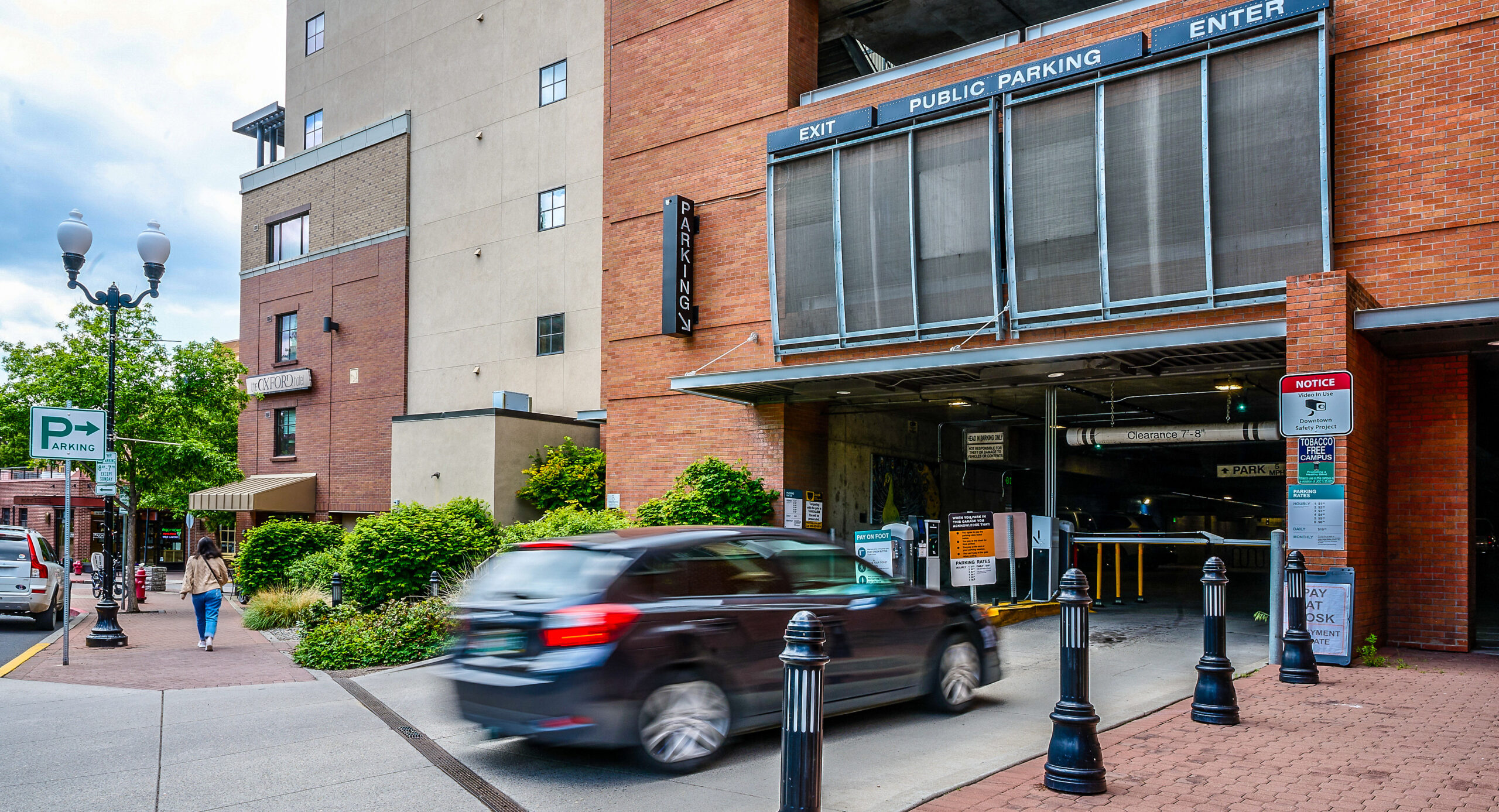 Car entering the Centennial parking garage entrance.