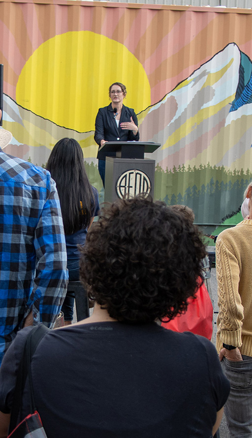 People watching Mayor Melanie Kebler speak at the 2024 CityFest event.