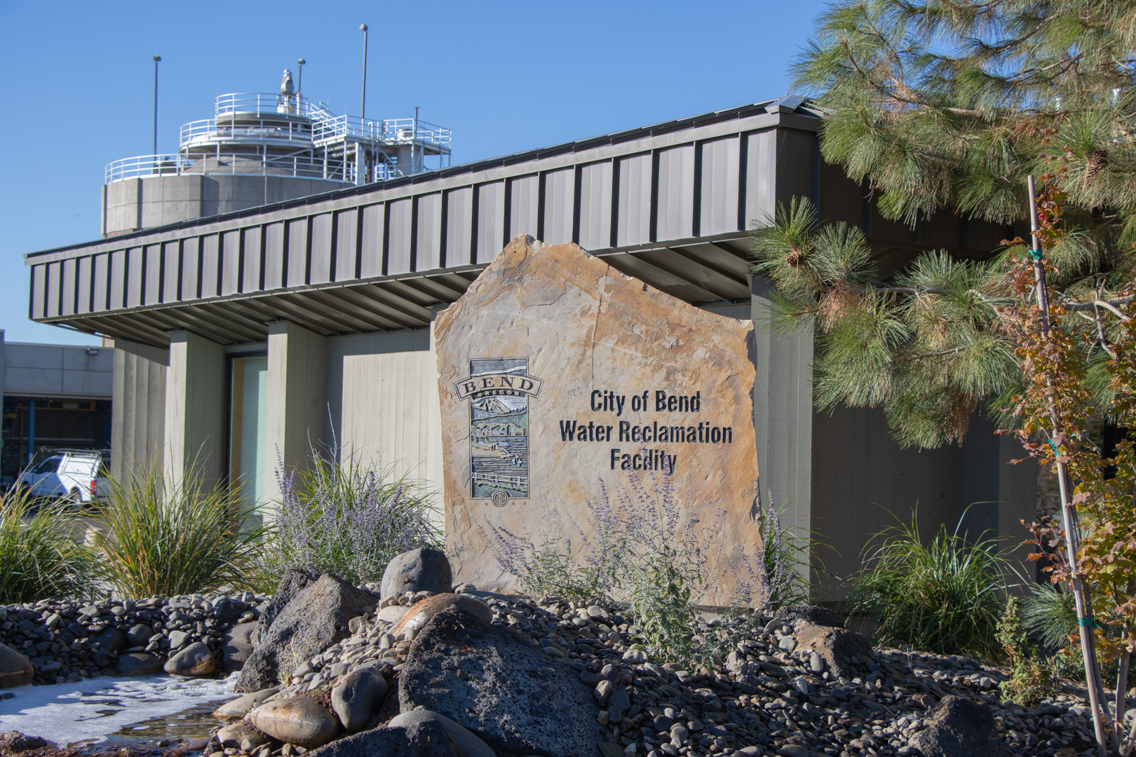 Photo of an office and a sign that says Water Reclamation Facility.