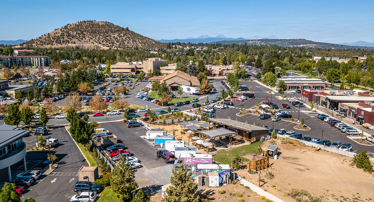 Bend looking west with Pilot Butte in the mid-ground and the Cascade Mountains in the background.