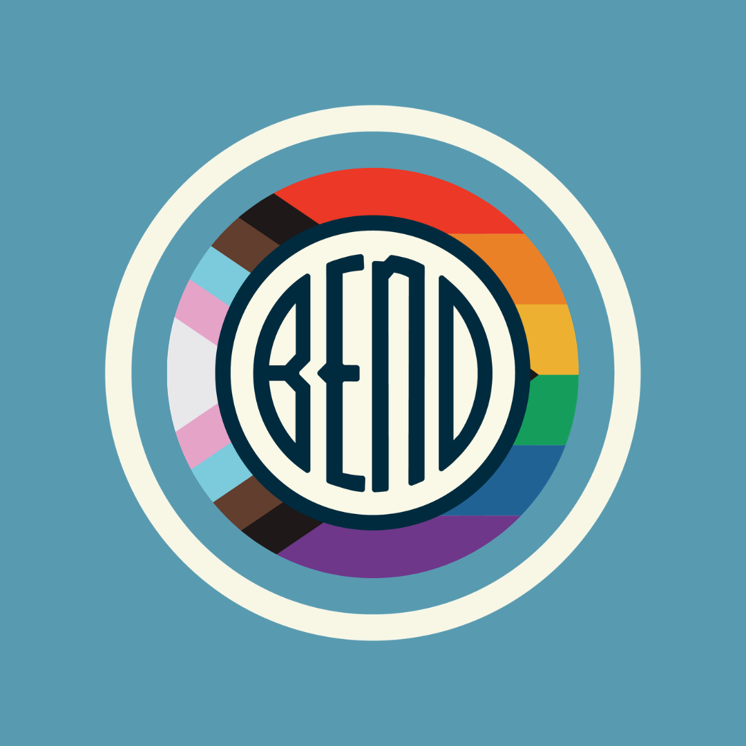 Bend logo on top of the Progress Pride Flag.