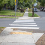 A crosswalk at a neighborhood intersection