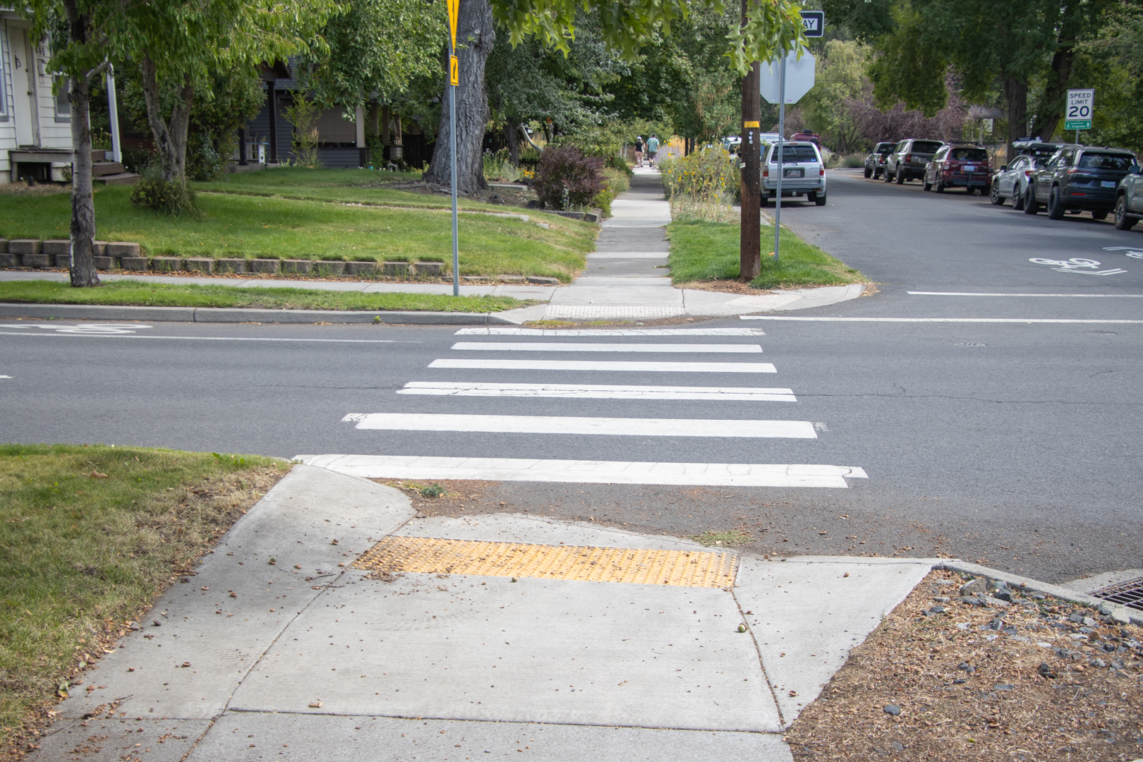 A crosswalk at a neighborhood intersection