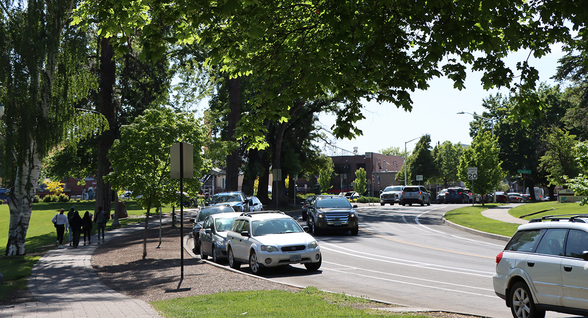Cars parked along a city street.