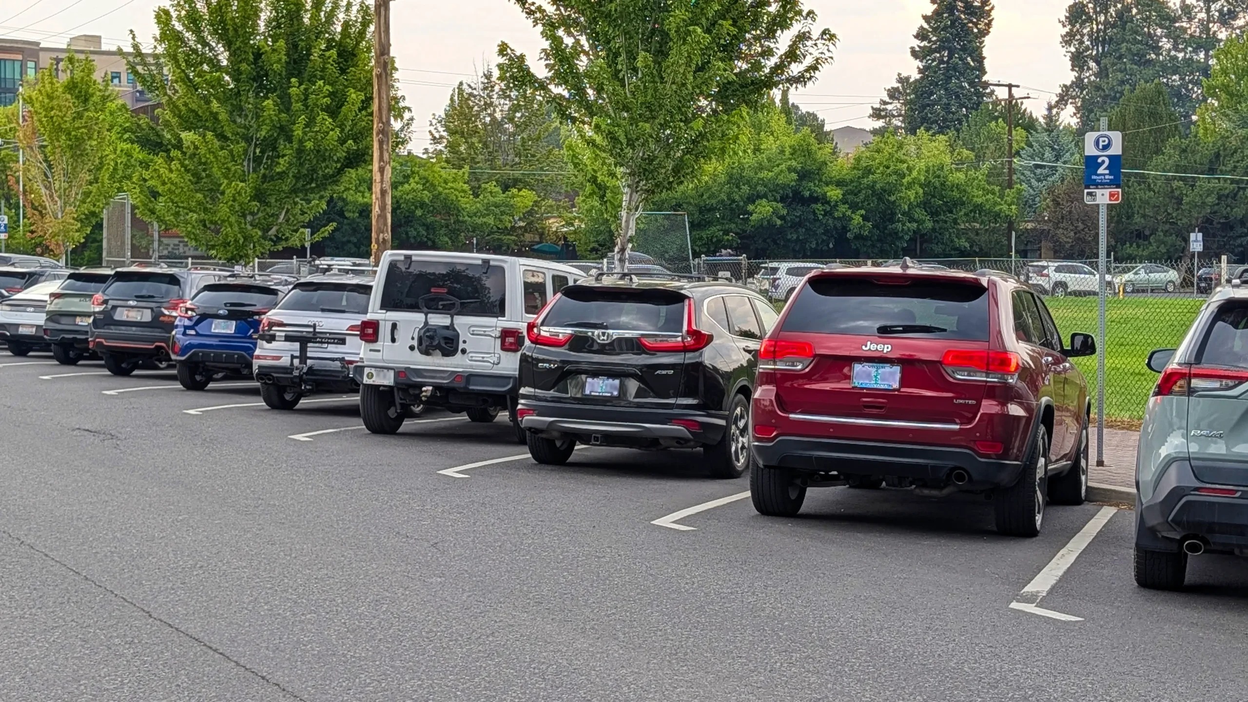 Cars parked diagonally in Downtown Bend.