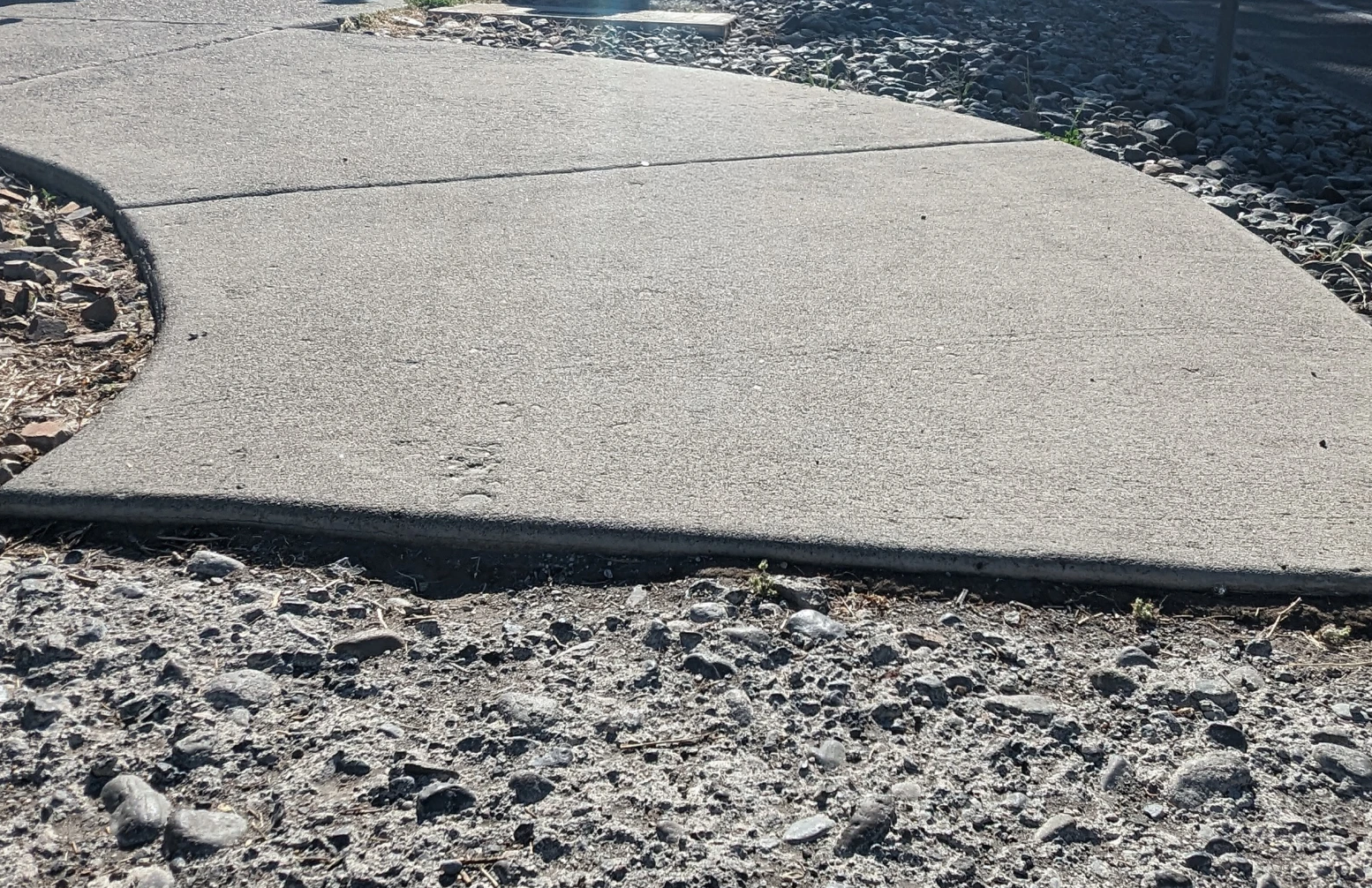 Sidewalk that ends abruptly.